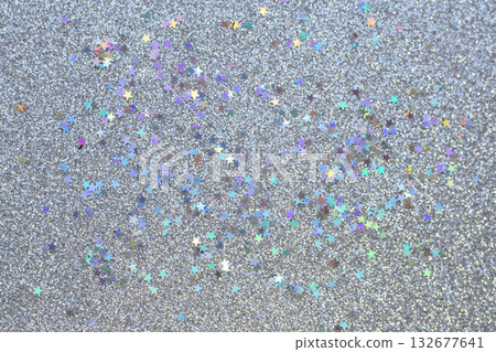 Sparkling glitter background with colorful star confetti and festive shimmer texture Sparkling glitter background with colorful star confetti and festive shimmer texture 132677641