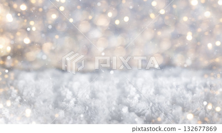 Winter scene with snowy foreground and golden bokeh lights creating a festive atmosphere Winter scene with snowy foreground and golden bokeh lights creating a festive atmosphere 132677869