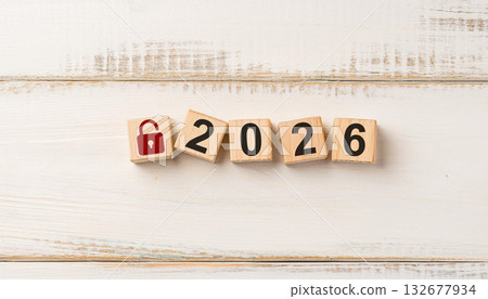 Red Padlock Icon and Wooden Blocks Showing 2026 Representing Cybersecurity and Data Protection Theme 132677934