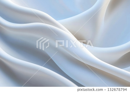 Soft white fabric drapes creating gentle waves 132678794