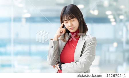 A young woman/businesswoman thinking A young woman/businesswoman thinking 132679241