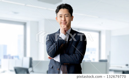 Smiling male businessman Smiling male businessman 132679770