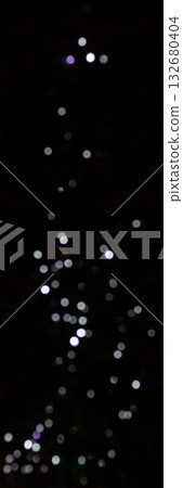 Abstract bokeh lights with dark background creating a dreamy and mystical effect 132680404