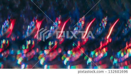 Blur disco leak. Gradient light reflection. Bokeh colorful mix kaleidoscopic flare in glass prism. Abstract neon luminosity glitter background. 132681696