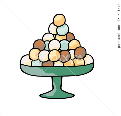 green  pedestal bowl filled with colorful ball candy 132681742