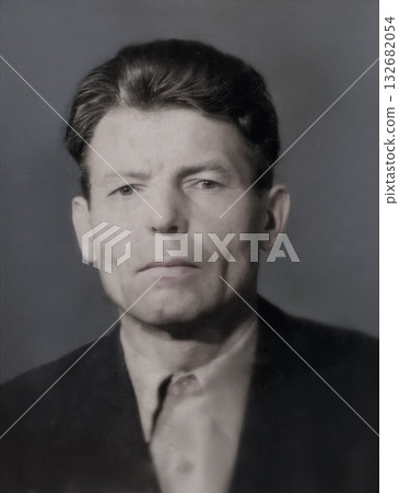 A vintage portrait of a serious, thoughtful middle-aged man. Retro photograph from 1971 A vintage portrait of a serious, thoughtful middle-aged man. Retro photograph from 1971 132682054
