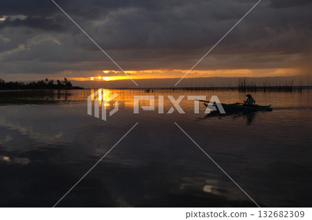 Sunset with fishing boat, at Panglao Island, Philippines Sunset with fishing boat, at Panglao Island, Philippines 132682309