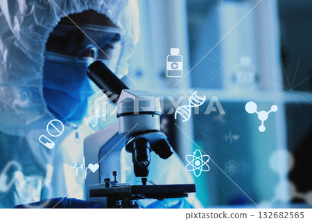 Scientist examining samples with a microscope in a laboratory during research activities Scientist examining samples with a microscope in a laboratory during research activities 132682565