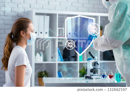 Health professional conducts a virtual consultation with a patient in a modern lab setting Health professional conducts a virtual consultation with a patient in a modern lab setting 132682597