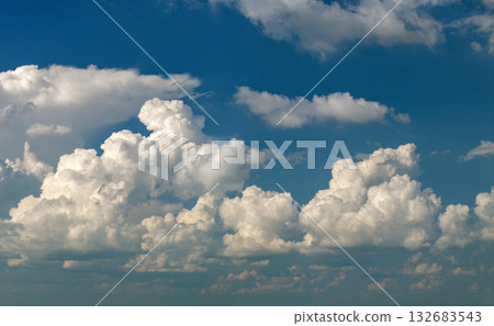Florida weather in summer rain season. Blue sky with white clouds. Bright skyscape Florida weather in summer rain season. Blue sky with white clouds. Bright skyscape 132683543