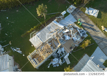 Florida Southwest region after hurricane season. Collapsed and damaged mobile homes in rural residential area. Consequences of severe natural disaster 132683545