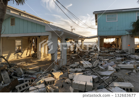 Destroyed houses on ocean shore after hurricane Milton landfall. Natural disaster consequences on Manasota Key, Florida. Storm surge severe damage Destroyed houses on ocean shore after hurricane Milton landfall. Natural disaster consequences on Manasota Key, Florida. Storm surge severe damage 132683677