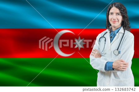 Azerbaijani medicine and healthcare concept. Close up of doctor against Azerbaijan flag background Azerbaijani medicine and healthcare concept. Close up of doctor against Azerbaijan flag background 132683742