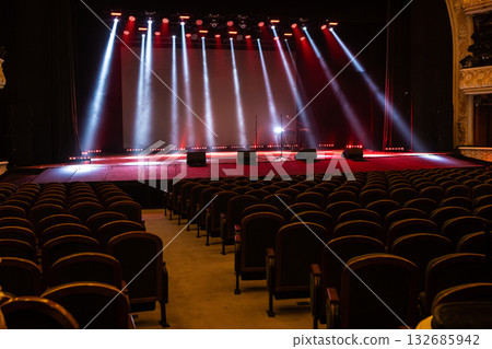 A spotlight on an empty stage. 132685942