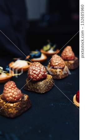 Gourmet chocolate desserts with gold raspberries. Gourmet chocolate desserts with gold raspberries. 132685960
