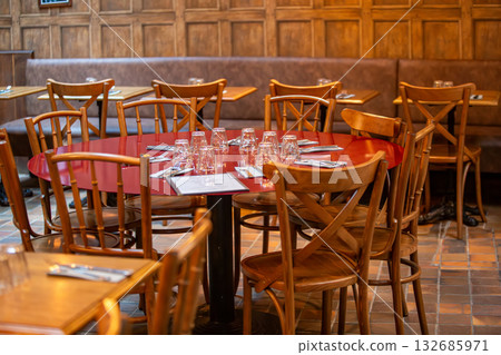 A classic bistro table awaits guests. A classic bistro table awaits guests. 132685971