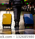 A traveler with colorful luggage. 132685980