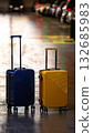 Two suitcases represent choices or partnership. 132685983