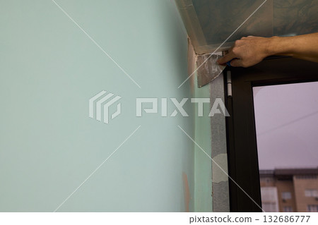 The Wall Repair Process Involves Properly Using Spackling Paste for a Quality Finish The Wall Repair Process Involves Properly Using Spackling Paste for a Quality Finish 132686777