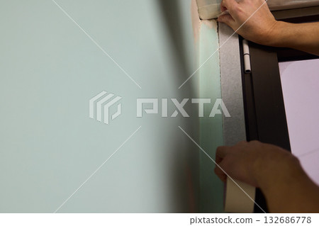 The Wall Repair Process Involves Properly Using Spackling Paste for a Quality Finish The Wall Repair Process Involves Properly Using Spackling Paste for a Quality Finish 132686778