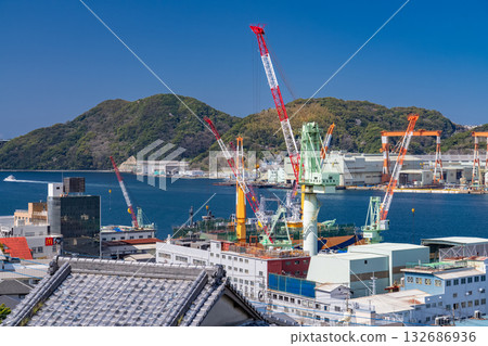 Nagasaki Prefecture: Port scenery of Nagasaki Port and the cityscape with shipyards Nagasaki Prefecture: Port scenery of Nagasaki Port and the cityscape with shipyards 132686936
