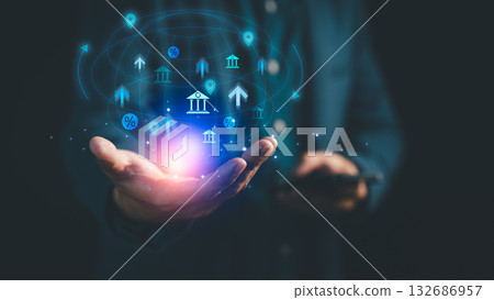 Digital banking and fintech innovation concept. Person holds a glowing globe with finance icons like banks, arrows and percentages, symbolizing global money transfer, investment and online finance. Digital banking and fintech innovation concept. Person holds a glowing globe with finance icons like banks, arrows and percentages, symbolizing global money transfer, investment and online finance. 132686957