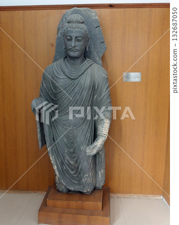 A statue of the Abhaya mudra Buddha, unfortunately missing its right arm, on display at the Taxila Museum in Pakistan, east of Gandhara A statue of the Abhaya mudra Buddha, unfortunately missing its right arm, on display at the Taxila Museum in Pakistan, east of Gandhara 132687050
