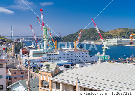 Nagasaki Prefecture: Port scenery of Nagasaki Port and the cityscape with shipyards 132687281