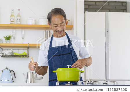 Senior men cooking 132687898