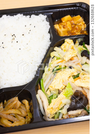 Delicious Chinese stir-fried meat, vegetables and eggs bento Delicious Chinese stir-fried meat, vegetables and eggs bento 132688628