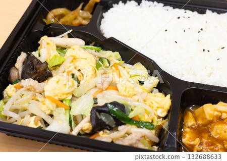 Delicious Chinese stir-fried meat, vegetables and eggs bento Delicious Chinese stir-fried meat, vegetables and eggs bento 132688633