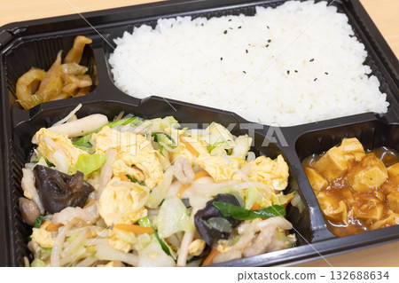 Delicious Chinese stir-fried meat, vegetables and eggs bento Delicious Chinese stir-fried meat, vegetables and eggs bento 132688634