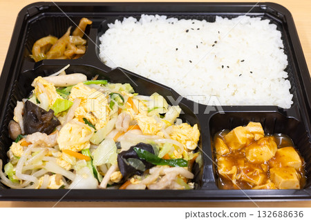 Delicious Chinese stir-fried meat, vegetables and eggs bento Delicious Chinese stir-fried meat, vegetables and eggs bento 132688636