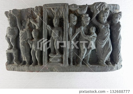 A small sculpture depicting the birth of Buddha, one of the Buddhist biographical sculptures on display at the Taxila Museum in the ancient city of Taxila, Pakistan. A small sculpture depicting the birth of Buddha, one of the Buddhist biographical sculptures on display at the Taxila Museum in the ancient city of Taxila, Pakistan. 132688777