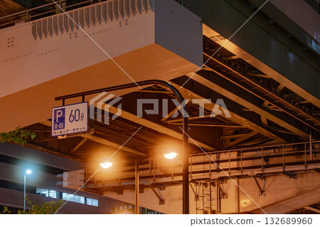 Night view of the junction, with bridge piers and the national highway below Night view of the junction, with bridge piers and the national highway below 132689960