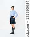 Full-body photo of a female student in uniform 132690084