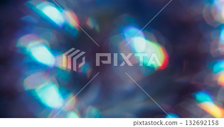 Defocused prism light. Reflection ray. Gradient bokeh colorful sparks. Mix lens blue orange neon luminosity abstract night background. 132692158