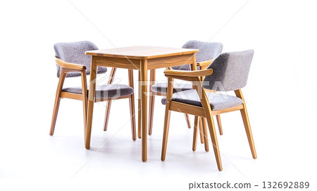 A wooden table with four chairs around it 132692889
