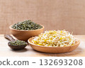 Mung bean sprouts and seeds on wooden background, Food ingredient in Asian cuisine 132693208