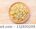 Mung bean sprouts on wooden background, Food ingredient in Asian cuisine 132693209