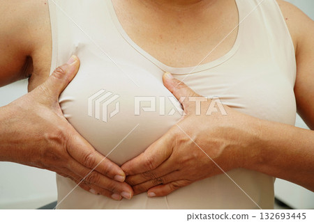 Asian woman self touching check lump or Breast cancer, Breast Self Exam. Asian woman self touching check lump or Breast cancer, Breast Self Exam. 132693445