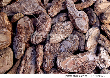 Bark chips that have faded after about two years of use 132693729