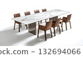 A long table with wooden chairs and a white tablecloth 132694066