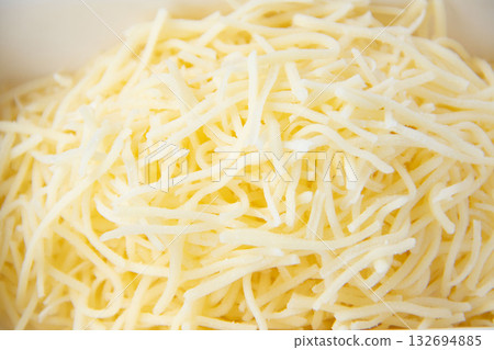 Shredded cheese Shredded cheese 132694885
