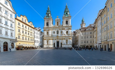 Stunning Baroque Church and Square in Prague Under Clear Blue Sk Stunning Baroque Church and Square in Prague Under Clear Blue Sk 132696026
