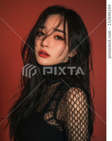 Korean woman with long black hair posing against a red background in a stylish outfit showcasing her beauty and confidence Korean woman with long black hair posing against a red background in a stylish outfit showcasing her beauty and confidence 132696284