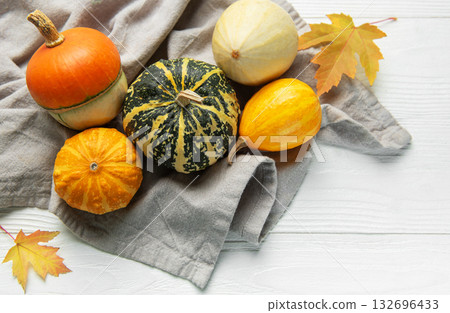 Pumpkins and gourds displaying autumn harvest season Pumpkins and gourds displaying autumn harvest season 132696433