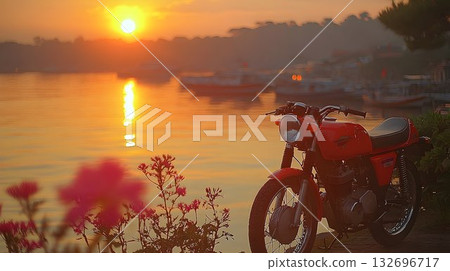 Sunset Serenity: Red Motorcycle by the Water 132696717