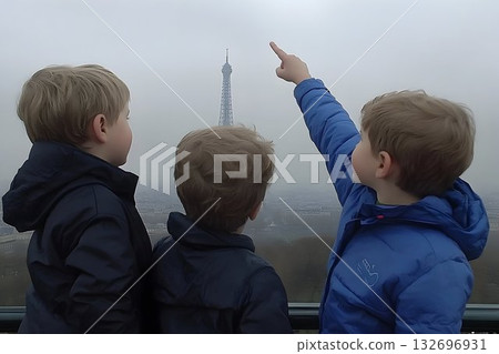 Three Boys Gaze at the Eiffel Tower on a Foggy Paris Day 132696931