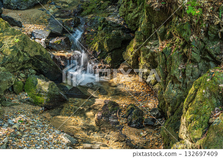 A mountain stream flowing into the Uji River, Momiji Valley, Uji City, Kyoto Prefecture 132697409